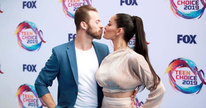 Nikki Bella and Artem Chigvintsev seek couple therapy: 'DWTS' to welcoming baby, a look at duo's relationship