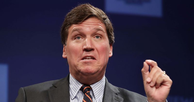 Fox News host Tucker Carlson apologizes after Georgia news station debunks his claims of dead people voting