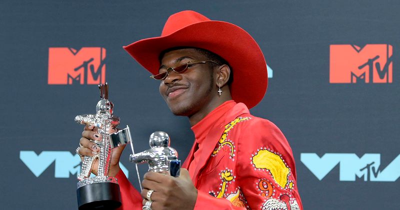 Lil Nas X rides waves of 'Holiday' success with eccentric pics, funny posts: 'Swipe right for good news'