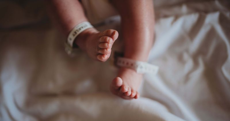 Baby girl's head catches flames as her cot is set on fire after mom leaves heater switched on all night