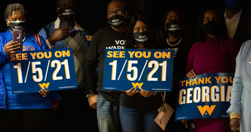 Georgia Senate runoff election: Nearly 2.1M vote early in crucial polls that will decide who rules Senate