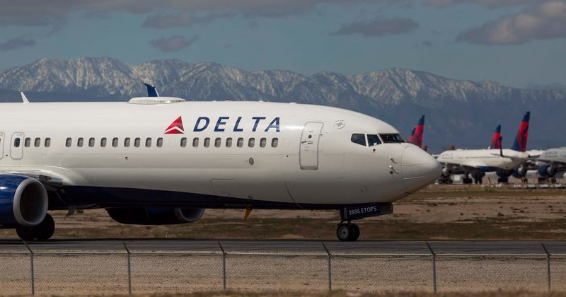 Woman deboarded from Delta flight for taking part in Capitol riot as passengers cheer: 'Get off the plane'