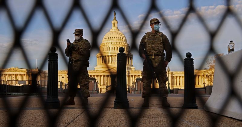 Reporter shoots video of Biden's inauguration security arrangements, Internet says 'charge him for sedition'