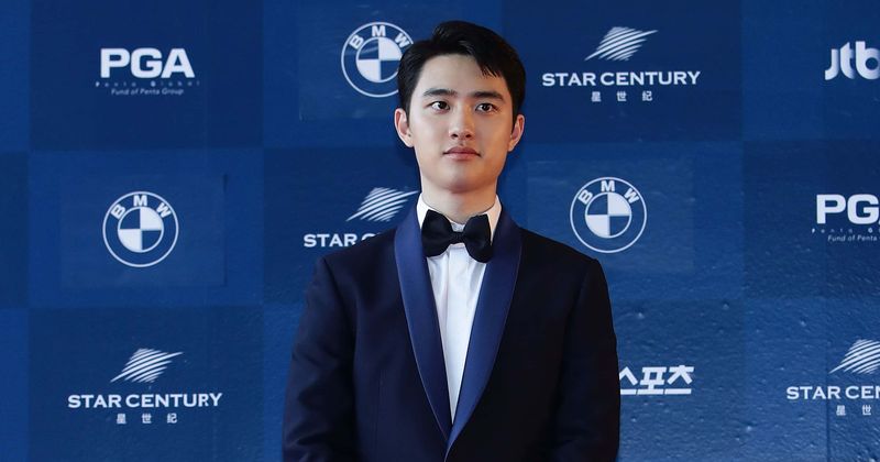 EXO's D.O. becomes second band member to complete military service, fans want solo album by 'precious Kyungsoo'