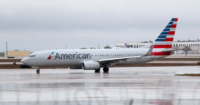 Utah family of 20 kicked off American Airlines flight after one member 'accidentally' dropped mask below nose
