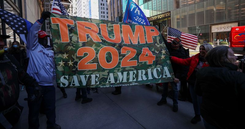 Trump supporters with huge Nancy Pelosi as demon flag clash with ‘Antifa and BLM' after Manhattan rally