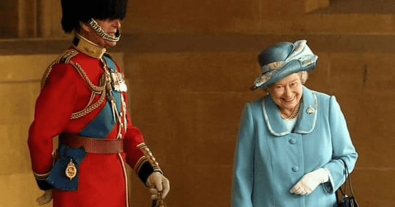 Queen giggling at Prince Philip in uniform in iconic photo: Here’s the heartwarming story of what made her laugh