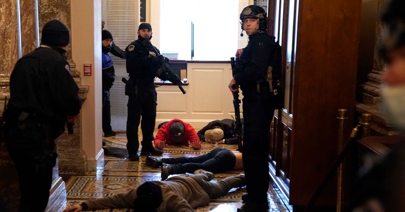 Capitol riots: Cops knew 'Congress itself is the target' but were told to avoid aggressive tactics, says report