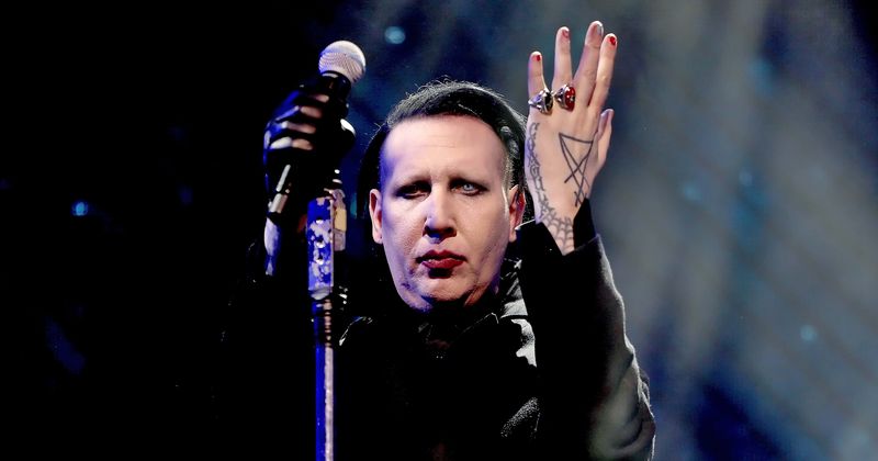 Marilyn Manson gets arrest warrant for allegedly 'shooting snot' during concert, lawyer calls it 'ludicrous'