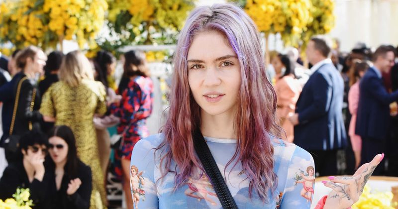 Grimes calls AI 'fastest path to communism' on viral TikTok, trolls say that's why 'she's with Elon Musk'