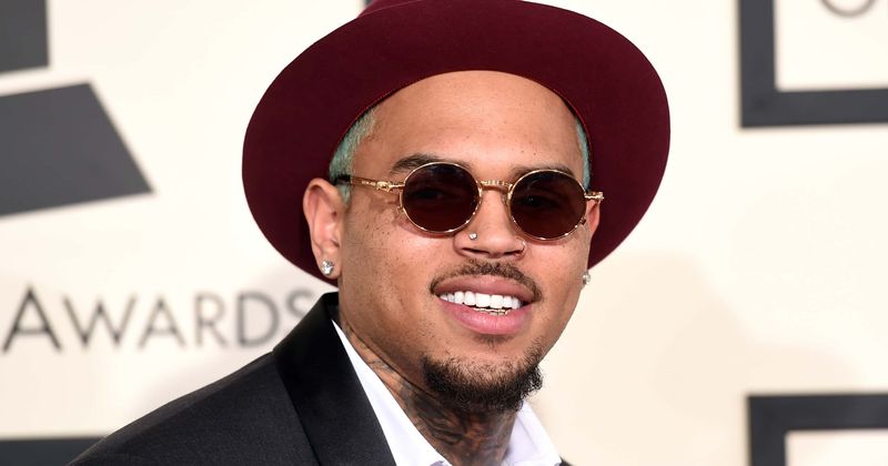 Chris Brown's ex-housekeeper sues rapper alleging he covered up brutal dog attack