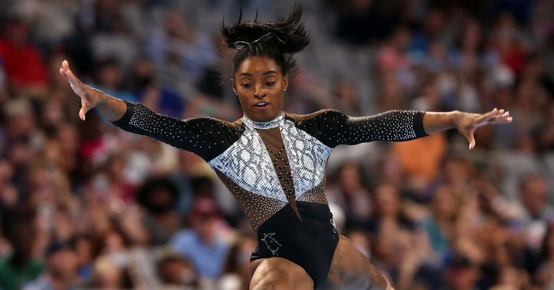 How Simone Biles braved kidney stone that left her crawling in pain to dominate world championships