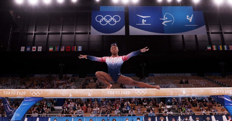 Simone Biles hailed for bronze win in Olympic balancing beam final: 'Gutsiest performance ever'