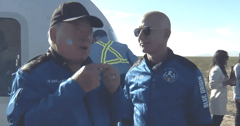 Jeff Bezos mocked for cutting William Shatner mid-speech to pop champagne after landing