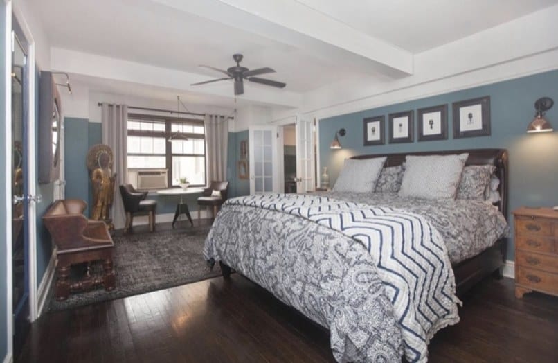 The master bedroom is slightly larger than the living room and includes two walk-in closets and a spacious bathroom.