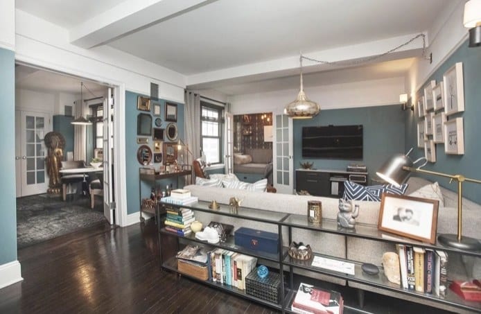 The unit, which Ferguson and his husband, Justin Mikita, purchased for $1,232,500 in early 2015, features an entrance hall that opens out onto the living room.