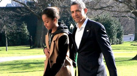 Barack Obama smoked 9 cigarettes a day in the White House and only quit when Malia caught him, reveals memoir