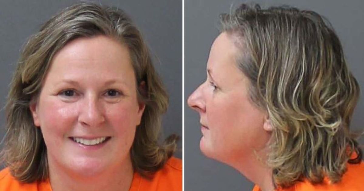 Kim Potter GRINS in mugshot after guilty verdict, says 'her